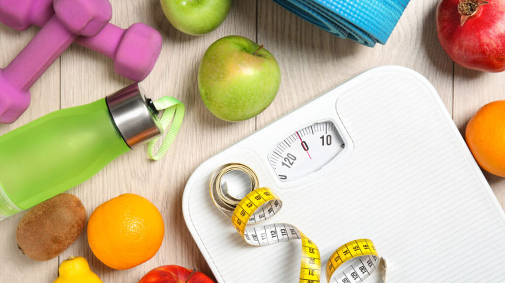 Photo of a balanced plate of healthy fruits and vegetables to support sustainable weight loss